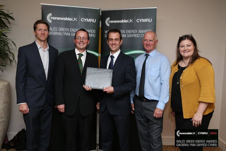RenewableUK present Dan McCallum of Egni with the Best New Startup award at the 2015 Wales Green Energy Awards.